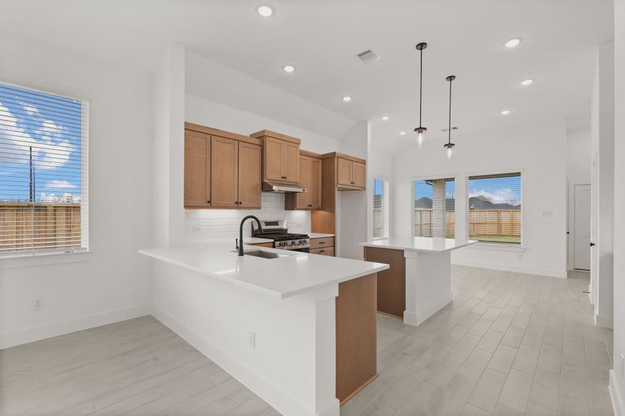 Representative furnished interior of a home built from the Pinehurst by Chesmar Homes in Riceland Alley Loads, Mont Belvieu (Image 4).
