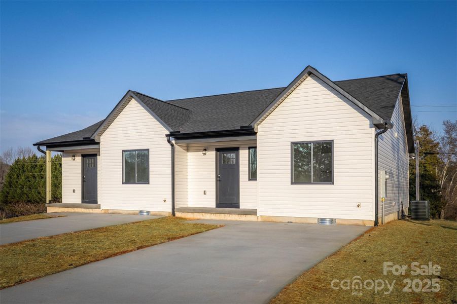 Front exterior of a new home in , Valdese, NC, highlighting curb appeal (Image 2). Front exterior of a new home in , Valdese, NC, highlighting curb appeal (Image 2).
