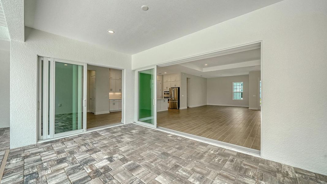 Spacious, unfurnished interior of a new home in Canoe Creek Real Estate and Homes for Sale in Parrish, FL - Neal Communities, Parrish (Image 22).