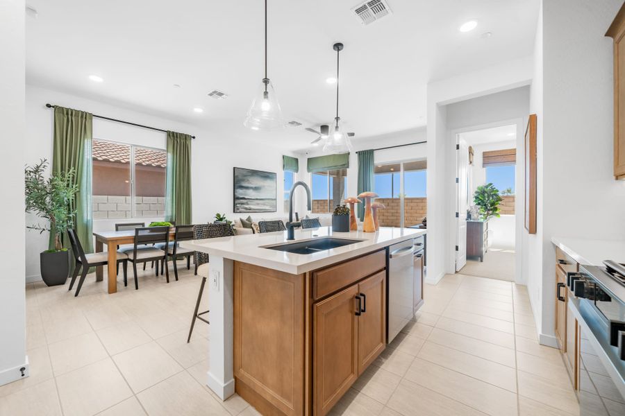 Kitchen & Dining Room | Brisa Model Home | Mira Vista at Victory in Buckeye, AZ by Landsea Homes