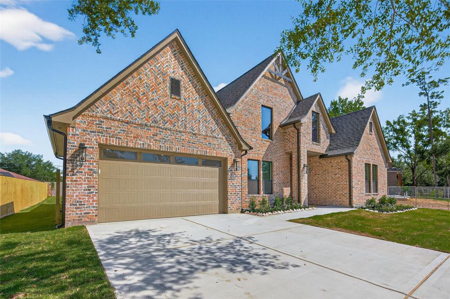 Front exterior of a new home in , Tomball, TX, highlighting curb appeal (Image 1).