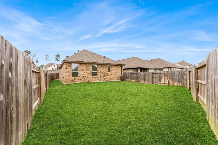 Exterior details and patio area of a home in , Conroe (Image 3). Exterior details and patio area of a home in , Conroe (Image 3).