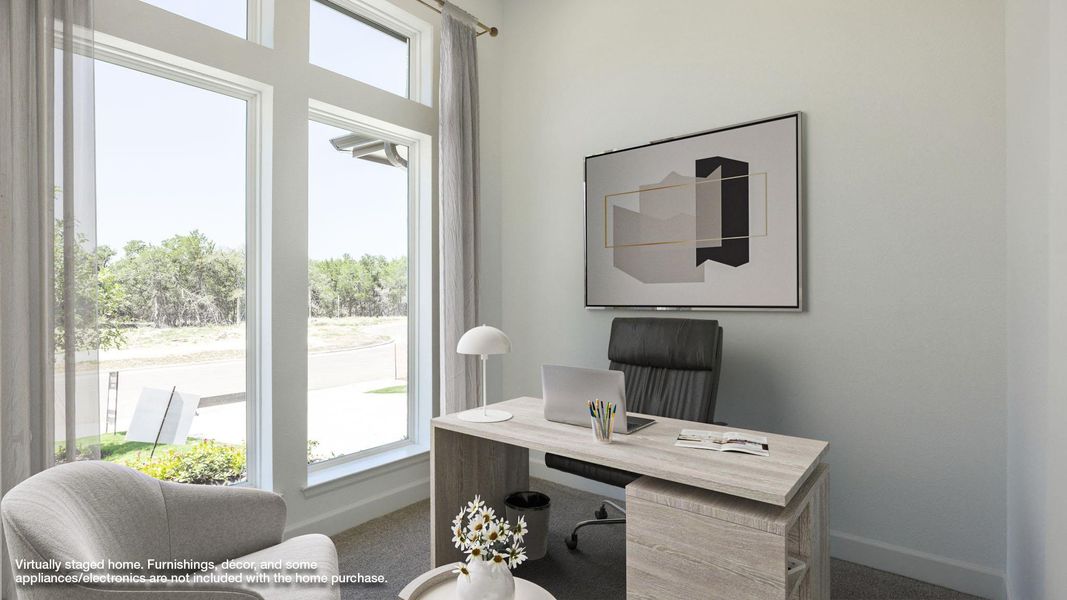 Carpeted office space with baseboards Carpeted office space with baseboards