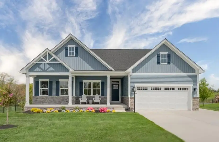 Front exterior of a new home in Pine Ridge Estates, Ridgeville, SC, highlighting curb appeal (Image 1).