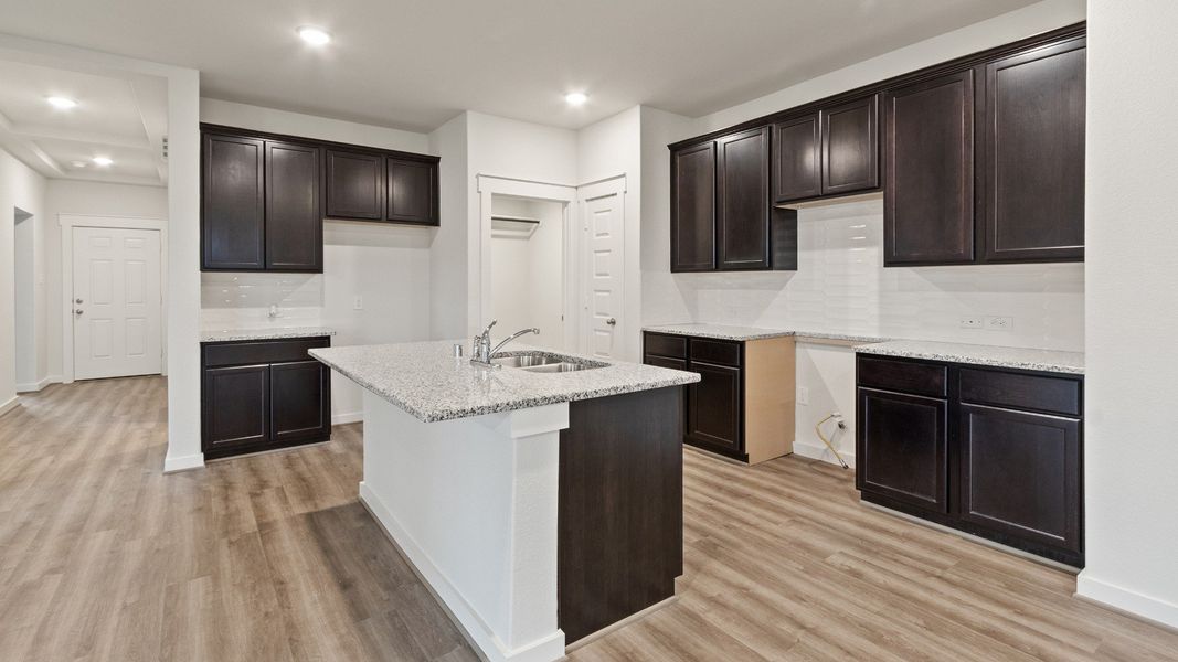 Representative furnished interior of a home built from the Driskill by Brightland Homes in Sunterra, Katy (Image 5).