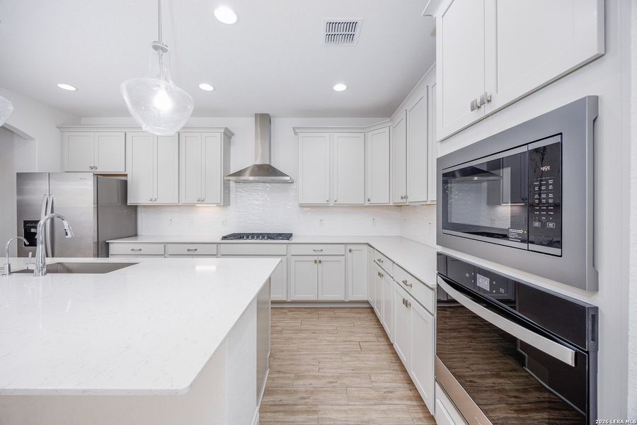 Furnished interior view inside a new home in Bison Ridge, San Antonio (Image 16).
