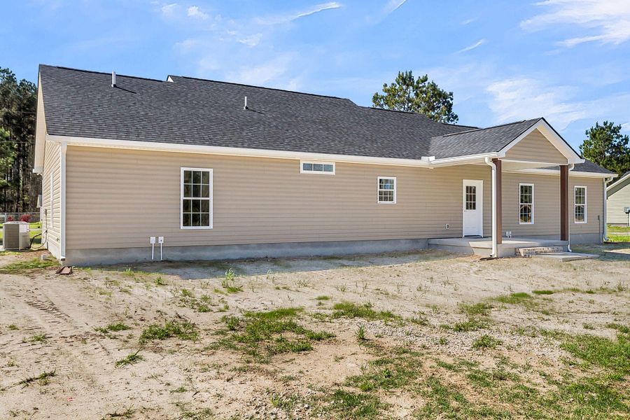 Exterior details and patio area of a home in , Round O (Image 26).