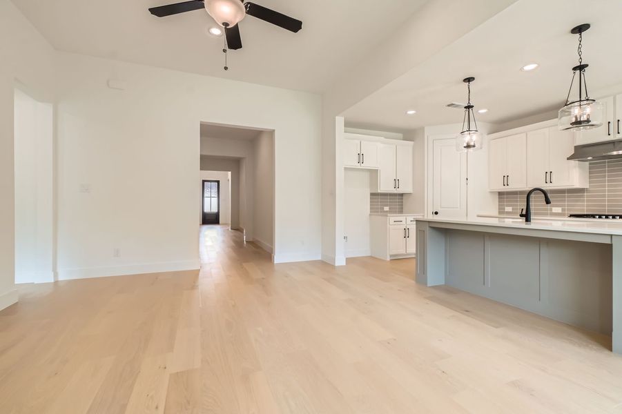 Plan 1560 Representative Photo - Living/Kitchen/Entry Plan 1560 Representative Photo - Living/Kitchen/Entry