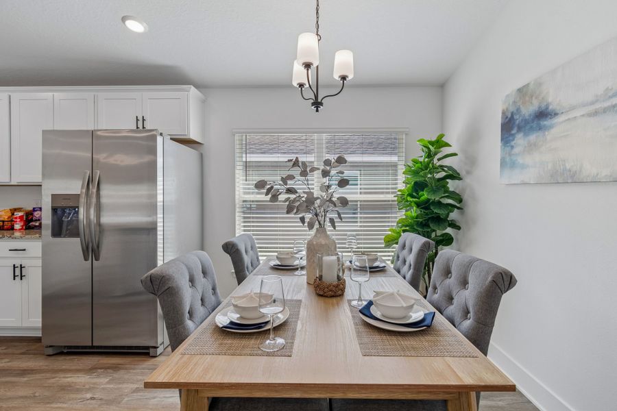 Representative furnished interior of a home built from the 1515 by Adams Homes in Winding Oaks, Weeki Wachee (Image 13).