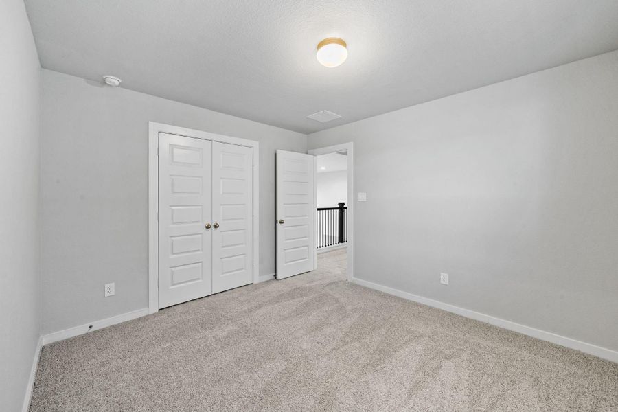 Spacious, unfurnished interior of a new home in Grand Oaks Village, Houston (Image 27).