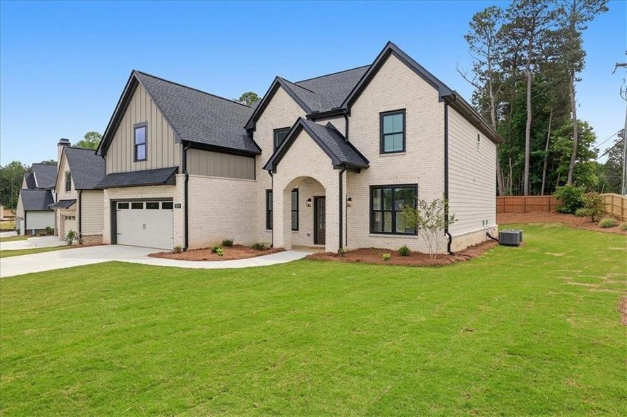 Front exterior of a new home in , Lawrenceville, GA, highlighting curb appeal (Image 27).
