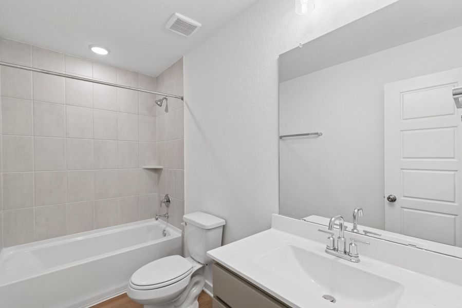 Furnished interior view inside a new home in Pinewood at Grand Texas, New Caney (Image 4).