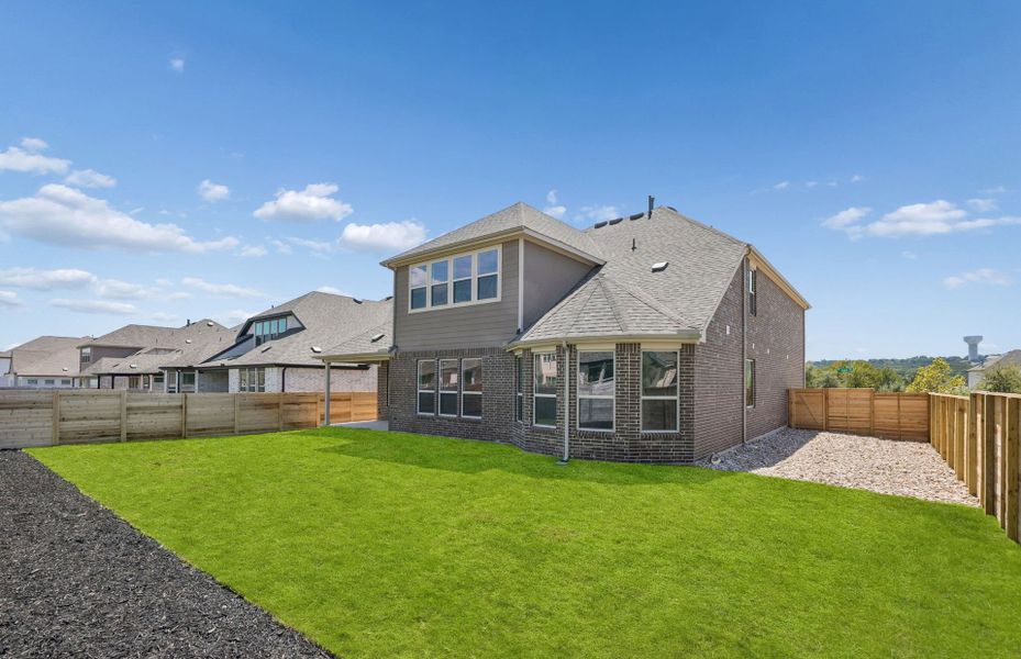 Exterior details and patio area of a home in Bluffview Reserve, Leander (Image 3).