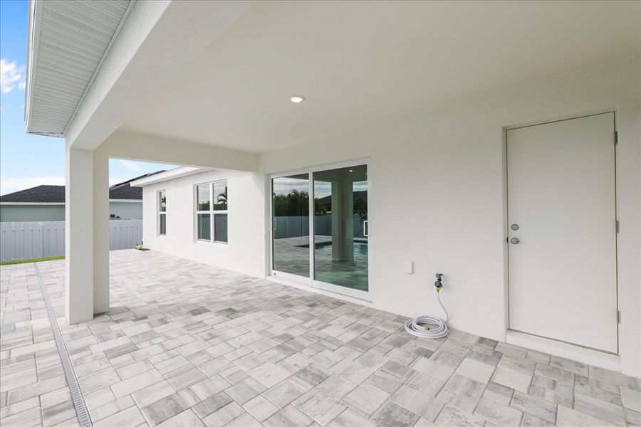 Representative exterior details of a home built from the The Sunset Harbor with Pool by Sunlife Homes LLC in Cape Coral, Cape Coral (Image 22). Representative exterior details of a home built from the The Sunset Harbor with Pool by Sunlife Homes LLC in Cape Coral, Cape Coral (Image 22).