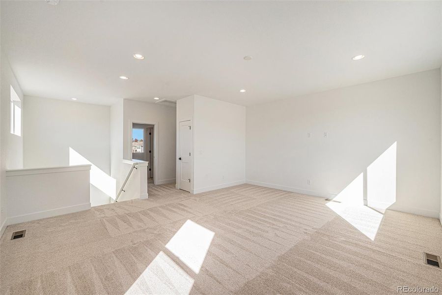 Spacious, unfurnished interior of a new home in Prelude at TAVA Waters, Denver (Image 14).