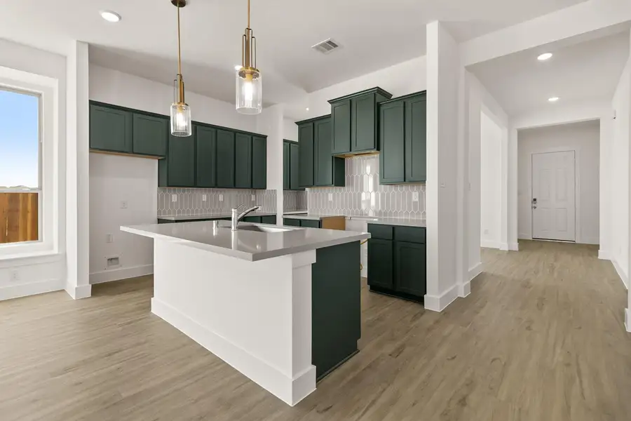 This beautiful brand new kitchen boasts stunning cabinetry that stretches to the ceiling, offering both style and ample storage for all your culinary treasures. REPRESENTATIVE IMAGE This beautiful brand new kitchen boasts stunning cabinetry that stretches to the ceiling, offering both style and ample storage for all your culinary treasures. REPRESENTATIVE IMAGE