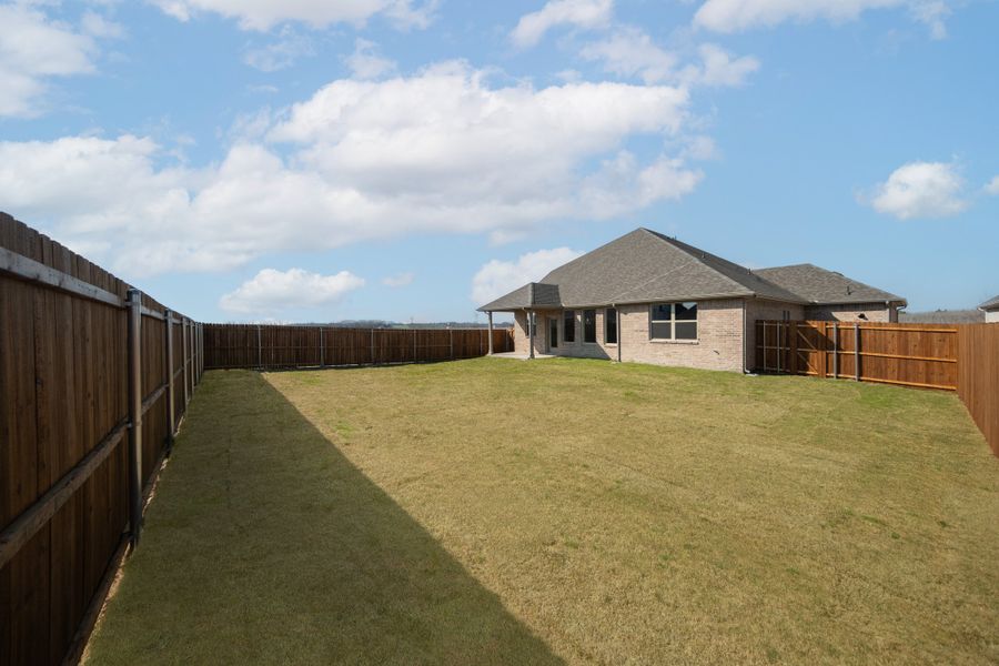 Exterior details and patio area of a home in Verandah, Royse City (Image 2). Exterior details and patio area of a home in Verandah, Royse City (Image 2).