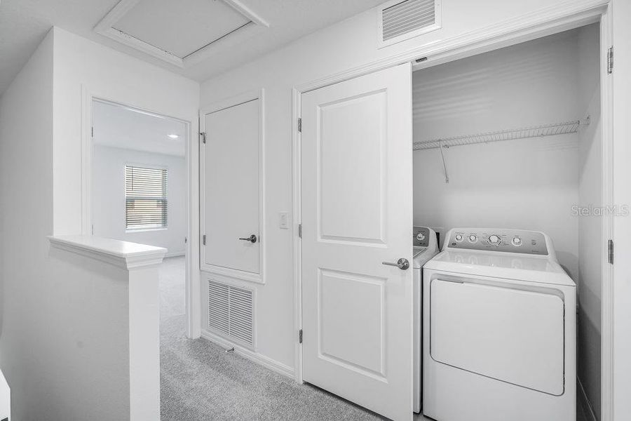 Furnished interior view inside a new home in The Townhomes at Skye Ranch, Sarasota (Image 11).