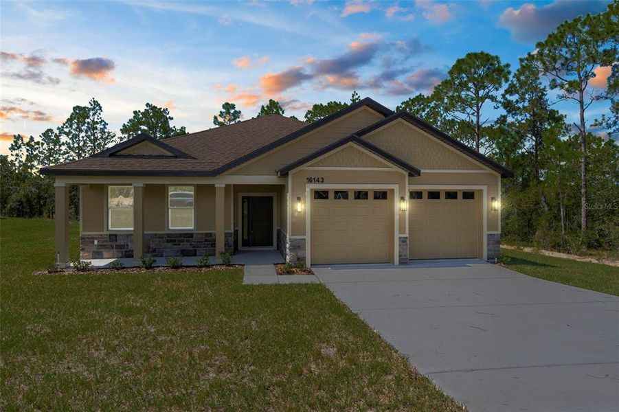 Front exterior of a new home in , Weeki Wachee, FL, highlighting curb appeal (Image 1). Front exterior of a new home in , Weeki Wachee, FL, highlighting curb appeal (Image 1).