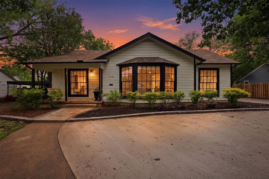 Front exterior of a new home in , Cleburne, TX, highlighting curb appeal (Image 24). Front exterior of a new home in , Cleburne, TX, highlighting curb appeal (Image 24).