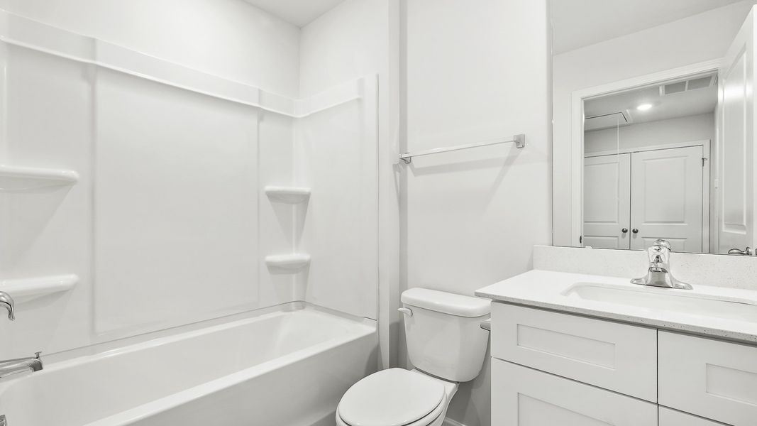 Furnished interior view inside a new home in North Village Townes, Greensboro (Image 6).