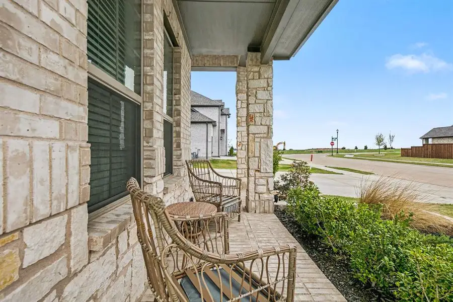 Exterior details and patio area of a home in Silo Mills, Joshua (Image 4).