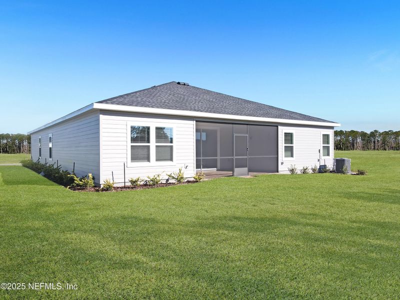 Front exterior of a new home in Saddle Oaks: Saddle Oaks 60s, Jacksonville, FL, highlighting curb appeal (Image 2).