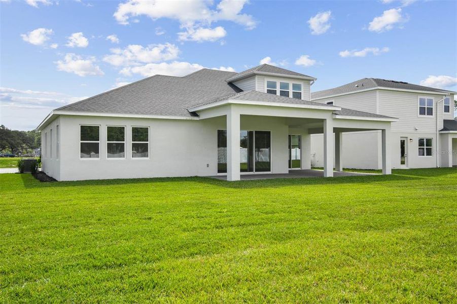Exterior details and patio area of a home in Solace at Corner Lake, Orlando (Image 39).