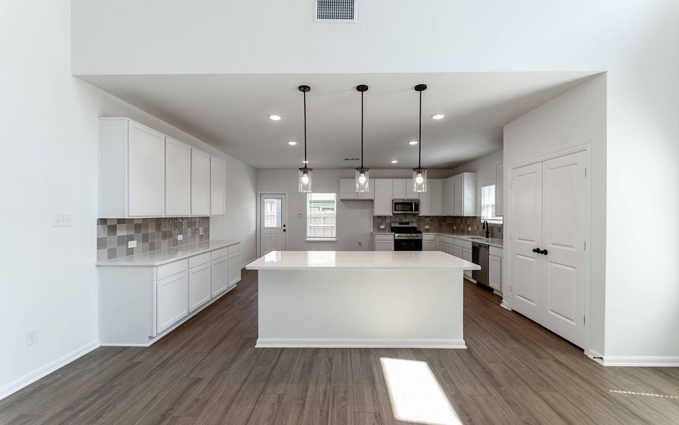 Furnished interior view inside a new home in Travis Ranch, Forney (Image 2). Furnished interior view inside a new home in Travis Ranch, Forney (Image 2).