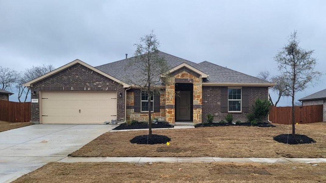 Front Elevation - 2001 Greenfield Drive - D.R. Horton's Frisco floorplan, elevation C - All Home and community information, including pricing, included features, terms, availability and amenities, are subject to change at any time without notice or obligation. All Drawings, pictures, photographs, video, square footages, floor plans, elevations, features, colors and sizes are approximate for illustration purposes only and will vary from the homes as built.