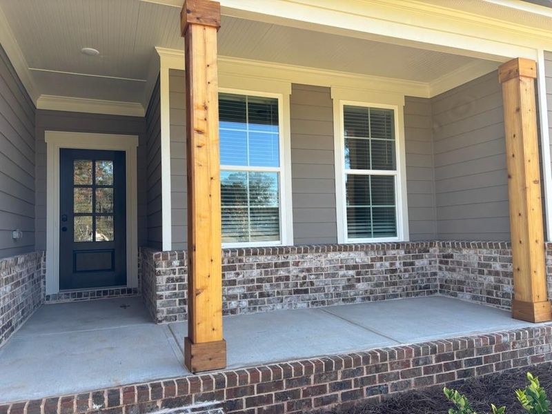 Exterior details and patio area of a home in Magnolia Ridge, Monroe (Image 3).