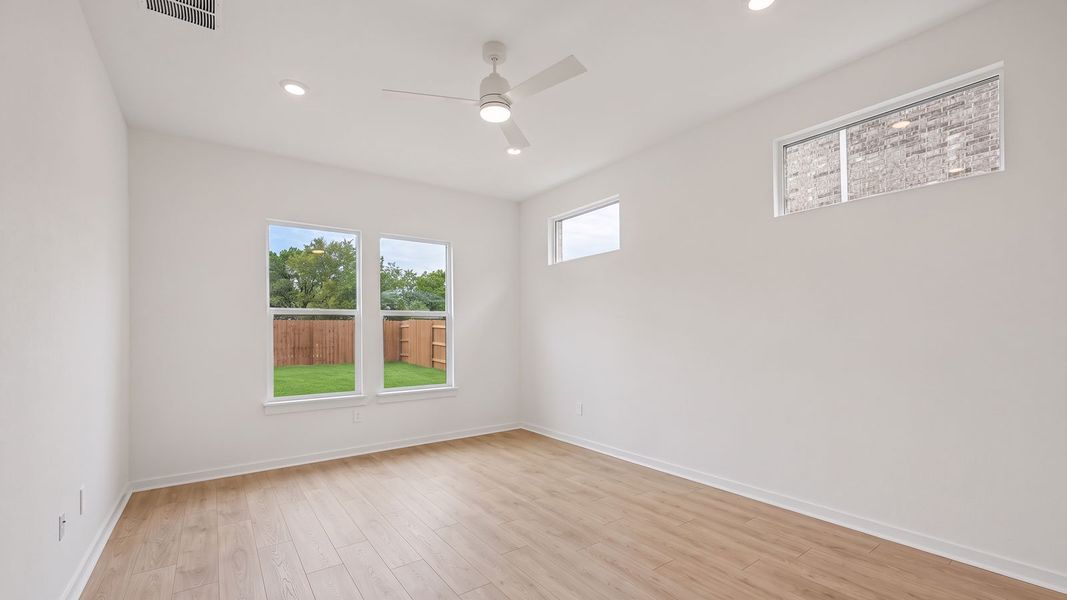 Spacious, unfurnished interior of a new home in The Enclave at Bar W Ranch, Leander (Image 20).