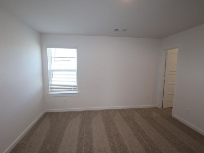 Spacious, unfurnished interior of a new home in Pinewood at Grand Texas, New Caney (Image 5).