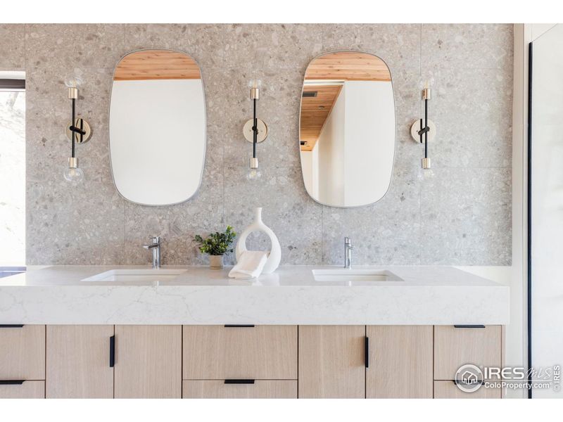 Escape to the en-suite spa bathroom to enjoy a large wet room shower and freestanding soaking tub, a private water closet and a floating terrazzo double vanity. Escape to the en-suite spa bathroom to enjoy a large wet room shower and freestanding soaking tub, a private water closet and a floating terrazzo double vanity.