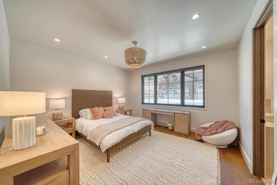 On the opposite side of the home, a separate bedroom wing includes three additional bedrooms and two full bathrooms. Bedroom #2 On the opposite side of the home, a separate bedroom wing includes three additional bedrooms and two full bathrooms. Bedroom #2