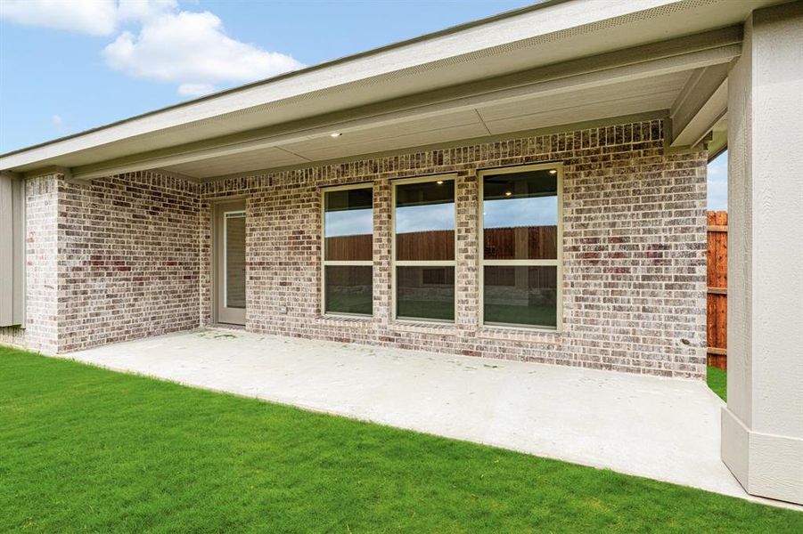 Front exterior of a new home in Sunset Ridge, Alvarado, TX, highlighting curb appeal (Image 23). Front exterior of a new home in Sunset Ridge, Alvarado, TX, highlighting curb appeal (Image 23).
