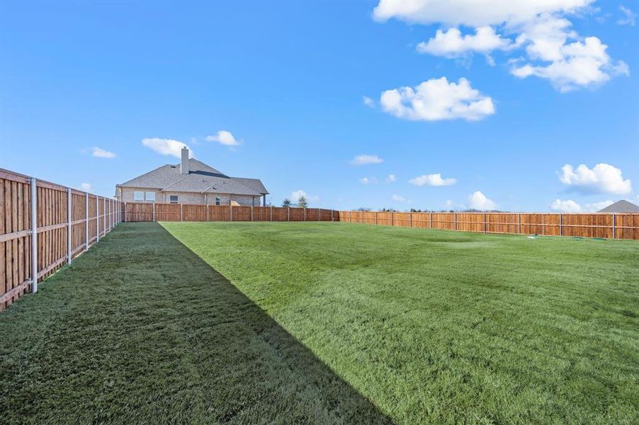 Exterior details and patio area of a home in Settlers Glen, New Fairview (Image 3).