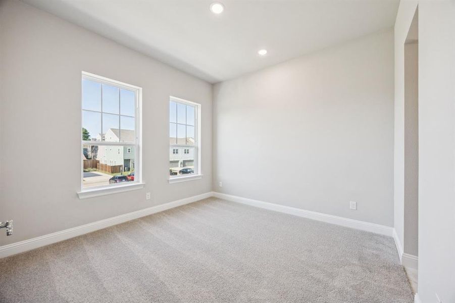 Natural light in secondary bedroom.
