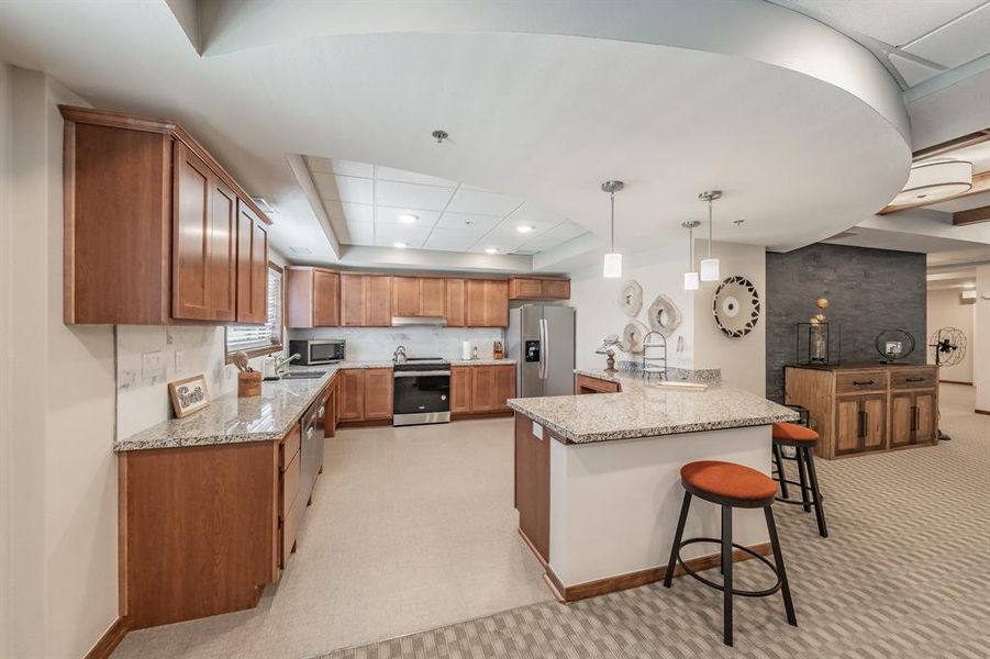 Additional spacious kitchen for social events.