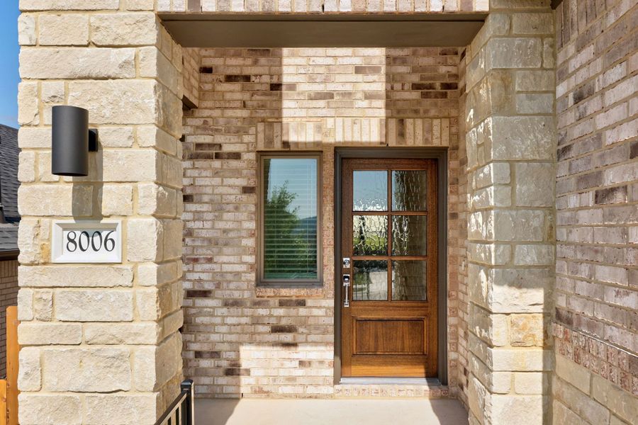 Exterior details and patio area of a home in Lakeside at Tessera, Lago Vista (Image 3).
