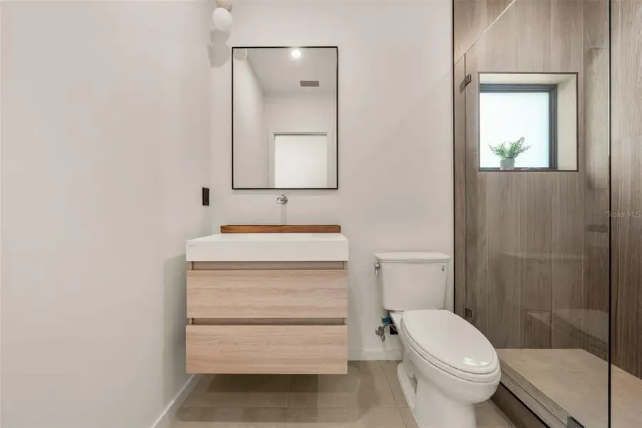 Furnished interior view inside a new home in , Sarasota (Image 21).