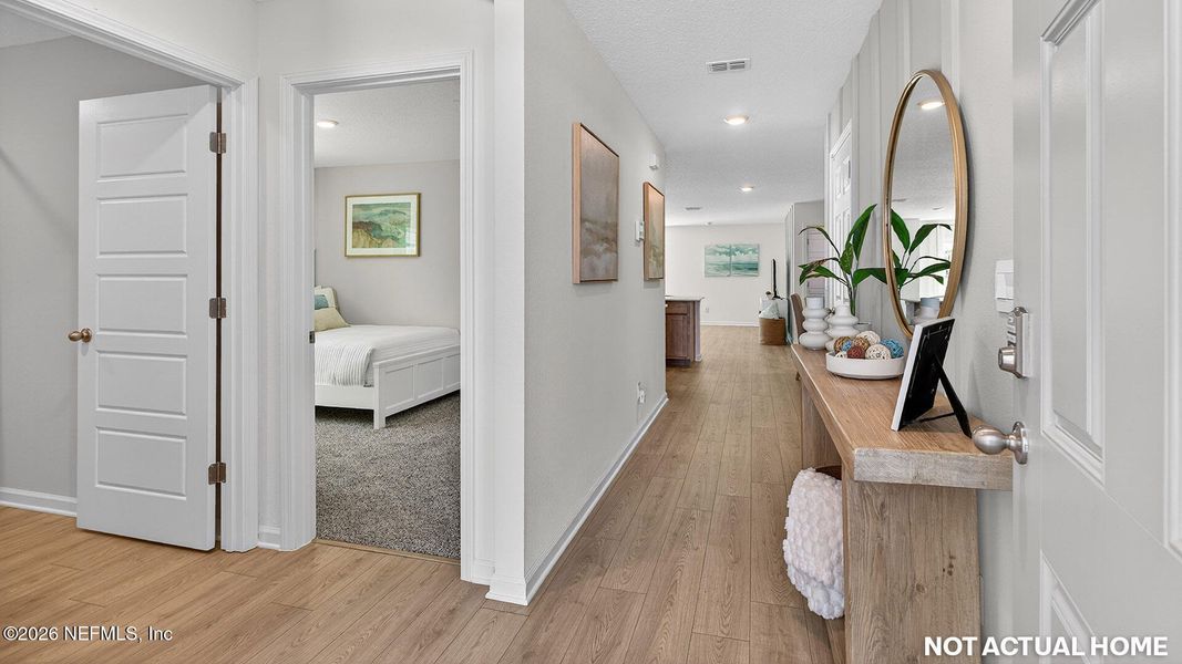 Furnished interior view inside a new home in Sawmill Branch, Palm Coast (Image 28).