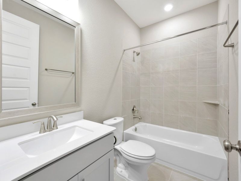 Furnished interior view inside a new home in Pine Lake Cove - Classic Series, Montgomery (Image 5).