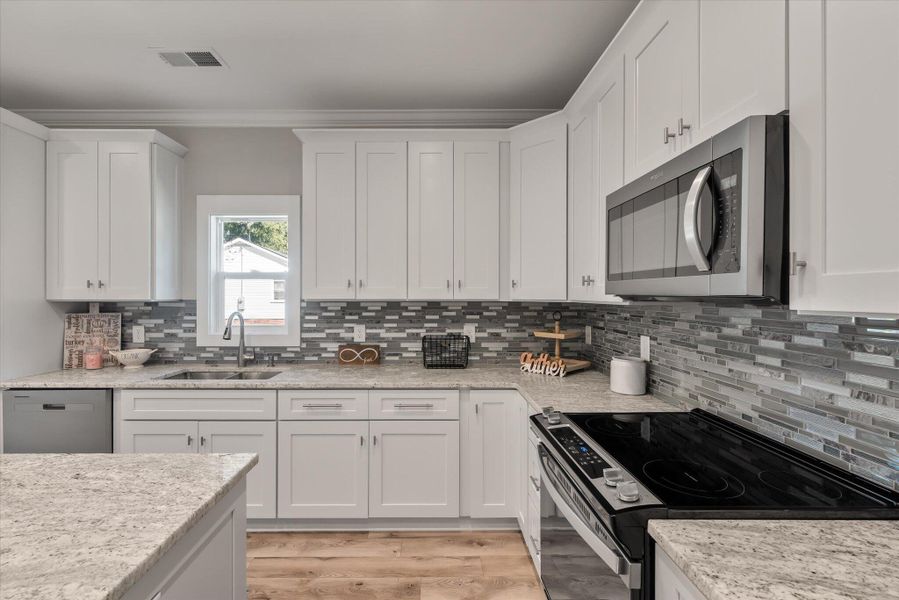 Furnished interior view inside a new home in , North Charleston (Image 5).