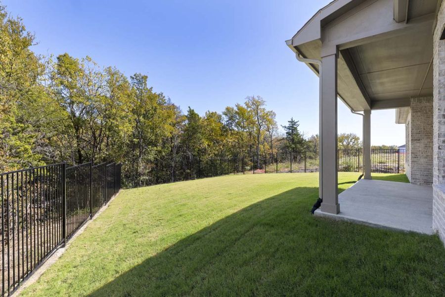 Exterior details and patio area of a home in Park Hills, Rockwall (Image 19).