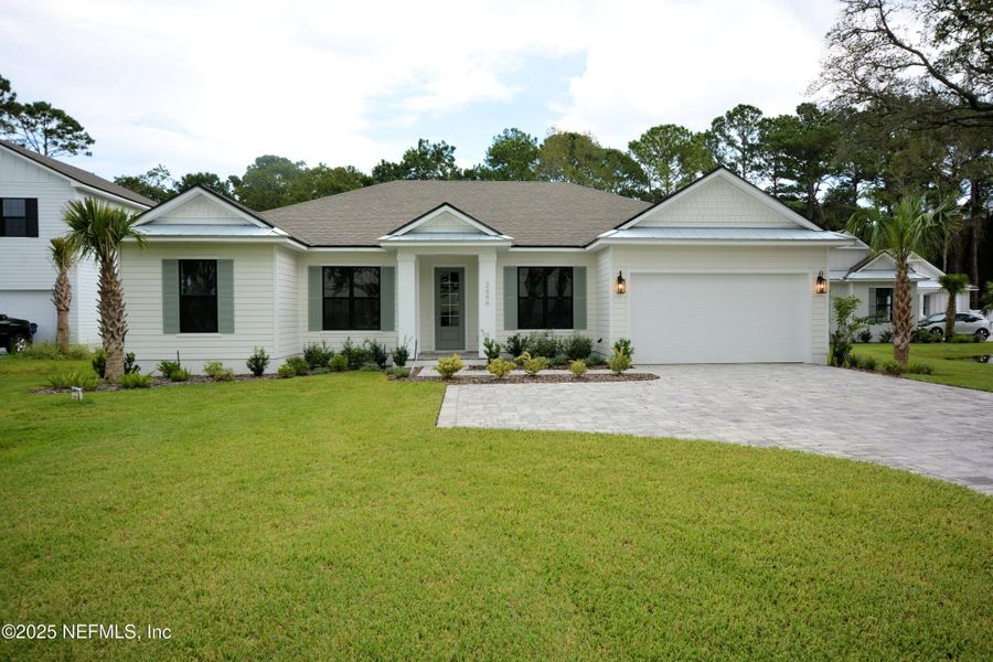 Front exterior of a new home in , Fernandina Beach, FL, highlighting curb appeal (Image 24).