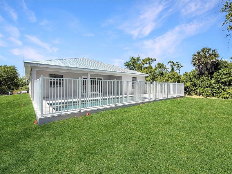 Exterior details and patio area of a home in , Port Charlotte (Image 13).