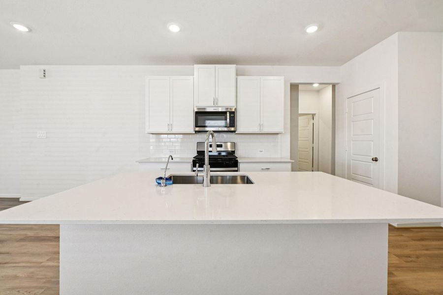 Furnished interior view inside a new home in Granger Pointe - Traditional Series, Conroe (Image 8).