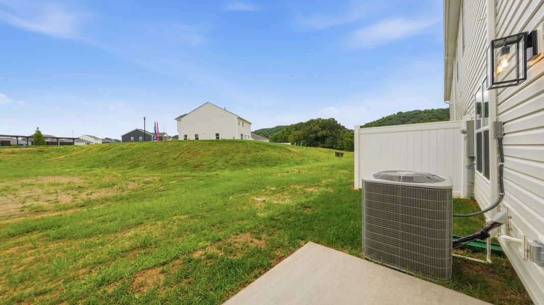 Exterior details and patio area of a home in Fieldcrest Acres Townhomes, Blountville (Image 4).