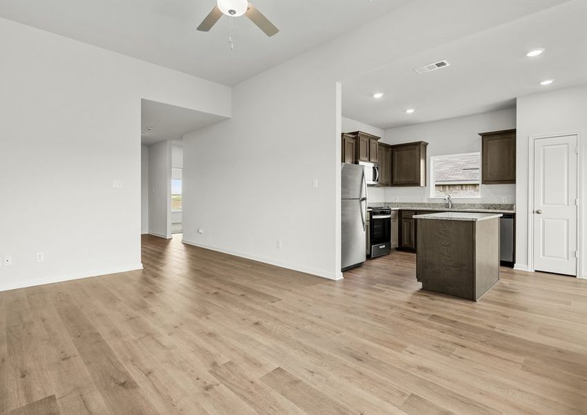 The family room sits right off of the kitchen. The family room sits right off of the kitchen.